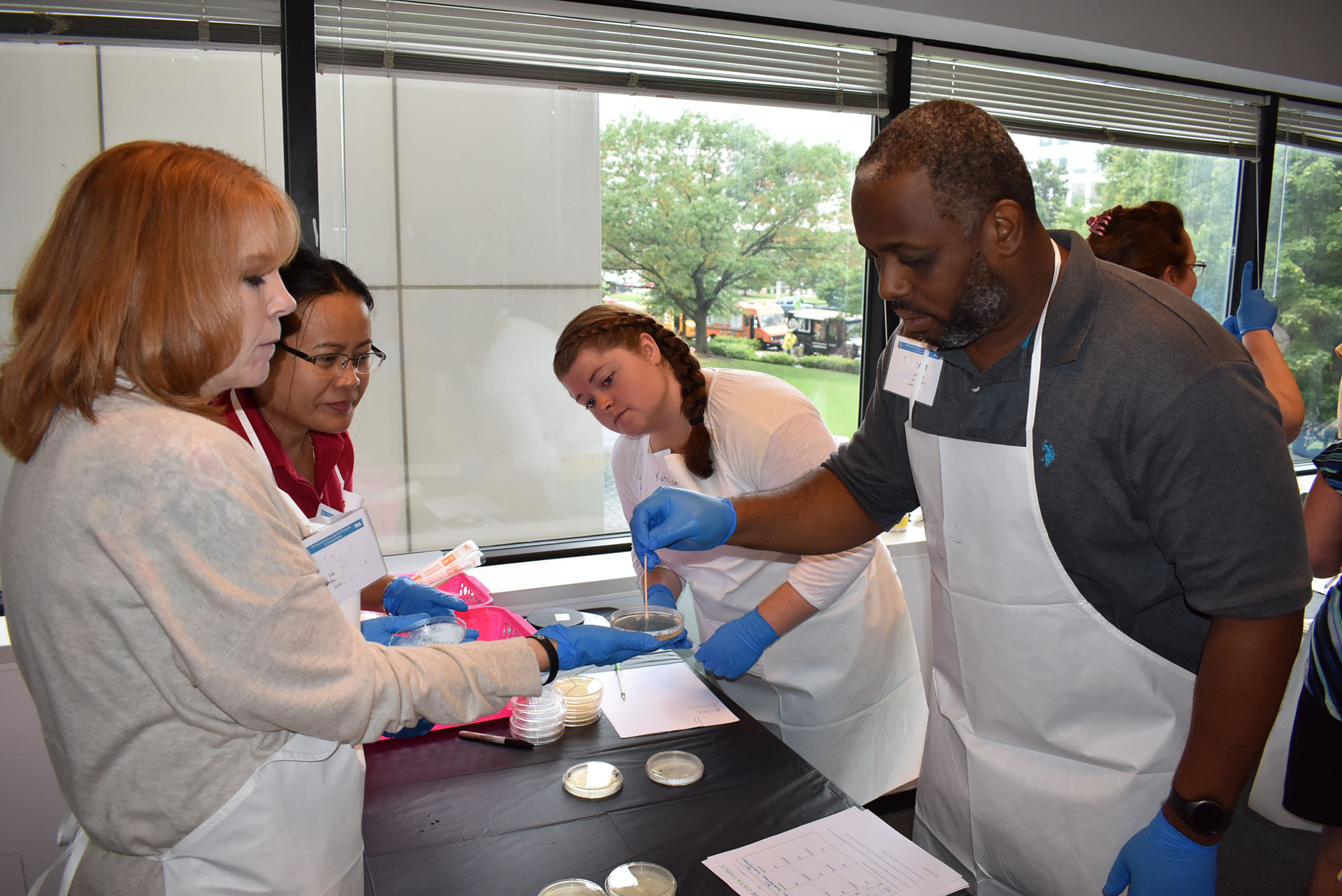 Teachers participating in a lab